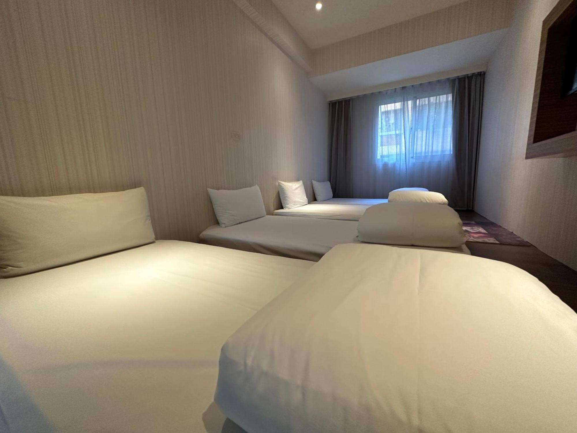Young Soarlan Hotel - טאינאן מראה חיצוני תמונה