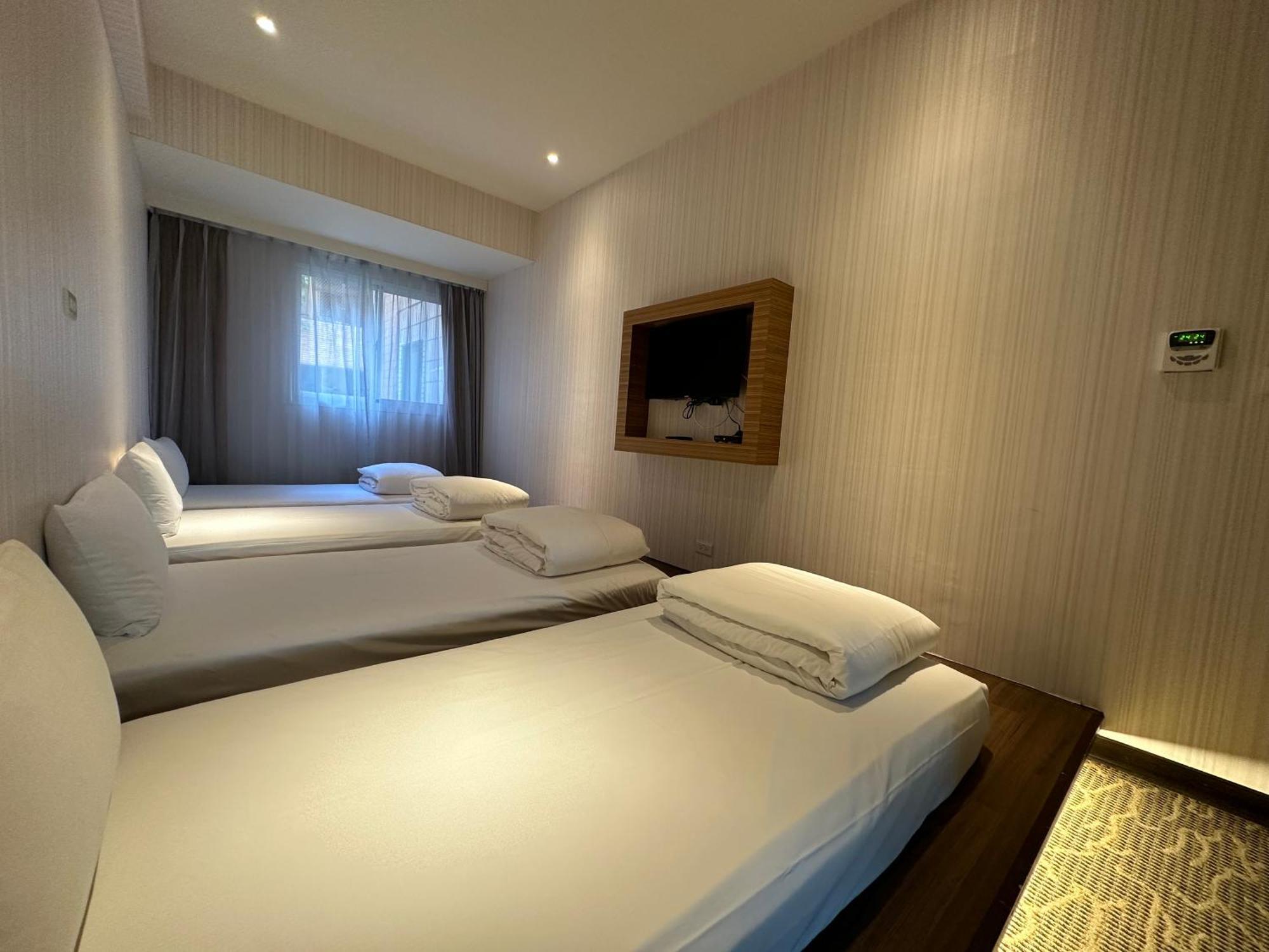Young Soarlan Hotel - טאינאן מראה חיצוני תמונה